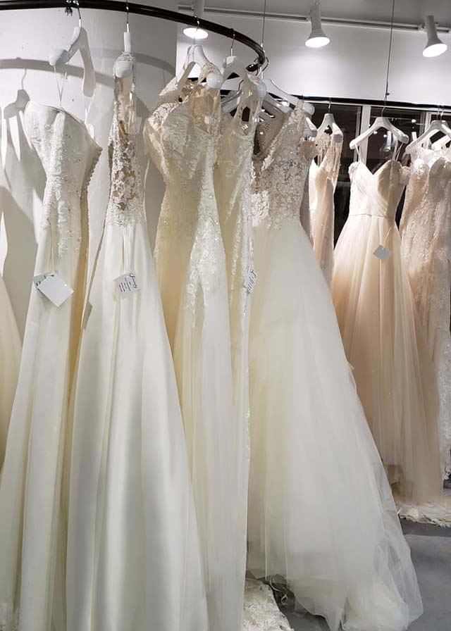 Rack of wedding dresses at Breathless Bridal